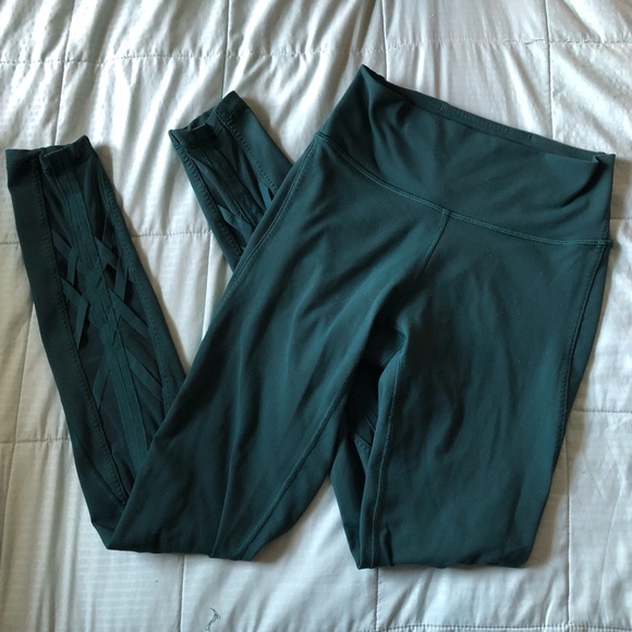 Lululemon essential rhythm pant leggings in deep green with mesh leg detail - Picture 1 of 5